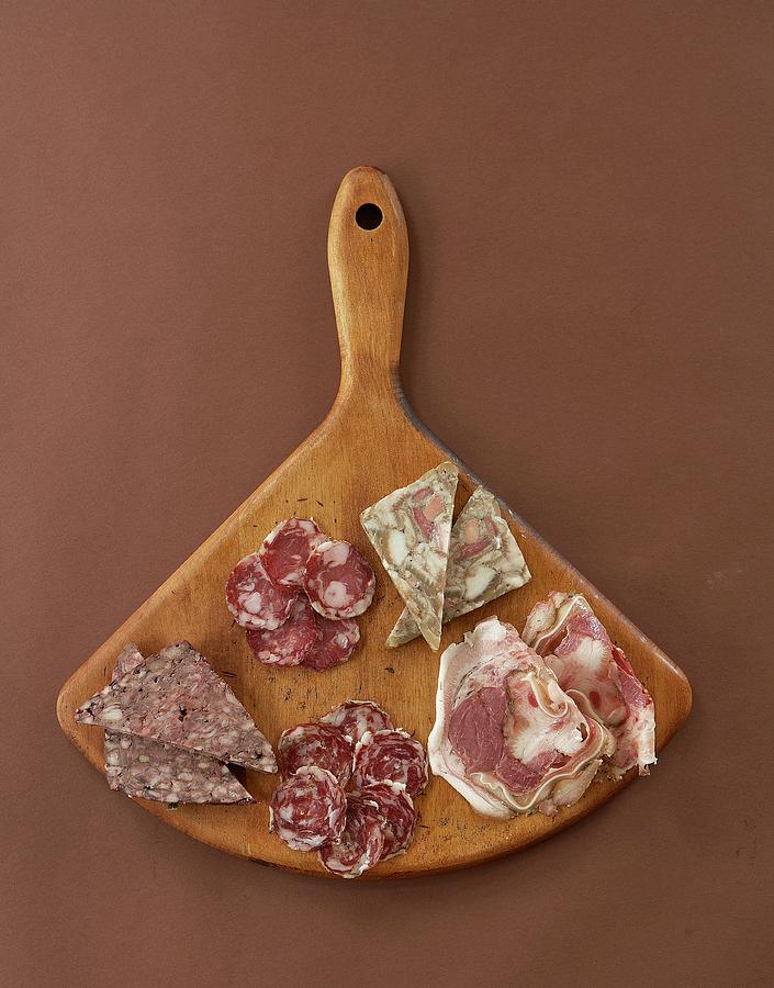 Slices Of Various Italian Meats On A Wooden Board seen From Above Photograph by Cedric Glasier Photography