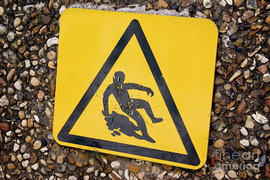 Slippery Surface Warning Sign Photograph by Mark Williamson/science ...