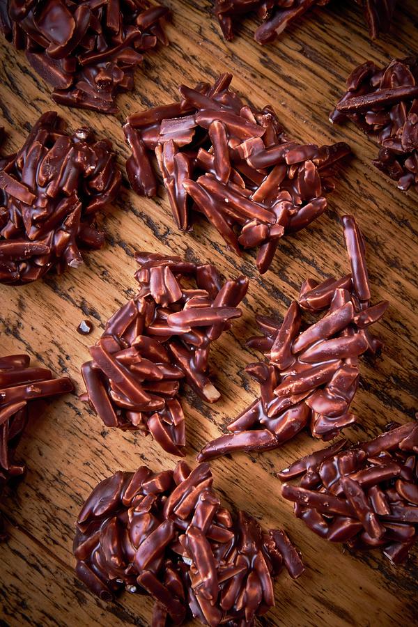 Slivered Almonds In Chocolate Photograph by Bernhard Winkelmann