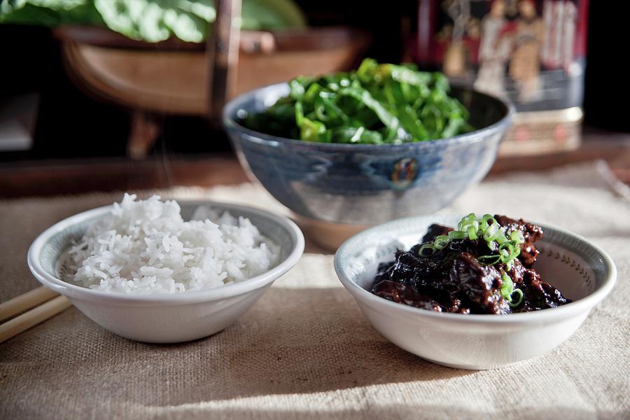 Slow-cooked Beef In Soy Sauce Seasoned With Five-spice Powder, Sugar And Chilli Served With Rice And Green Vegetables Photograph by George Blomfield