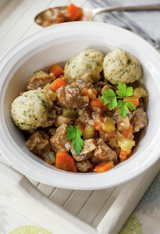 Slow Cooked Beef Stew With Bread Dumplings Photograph by Jonathan Short ...