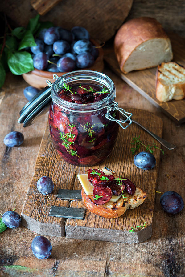 Slowly Roasted Plums With Thyme Photograph by Irina Meliukh