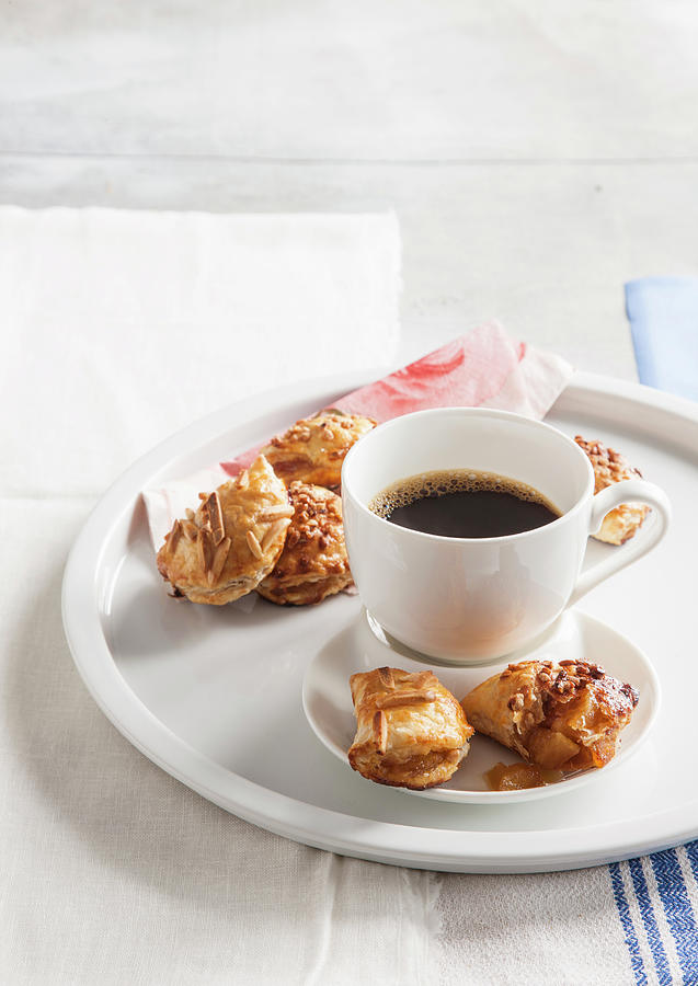 Small Apple Pies With Honey And Almonds, Served With Coffee Photograph by Danny Lerner