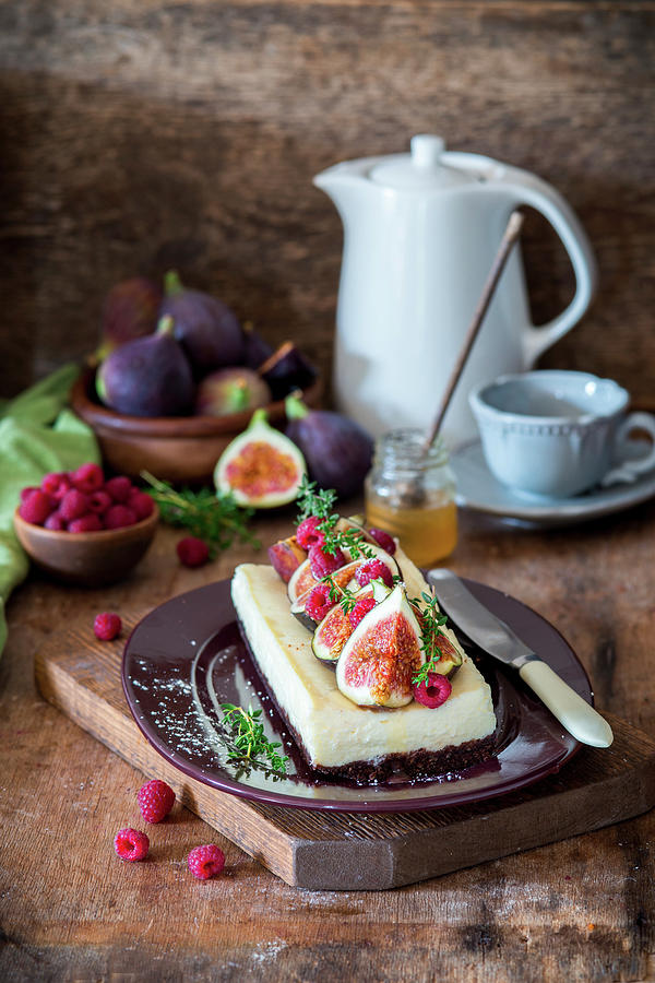 Small Cheesecake With Figs And Raspberries Photograph by Irina Meliukh
