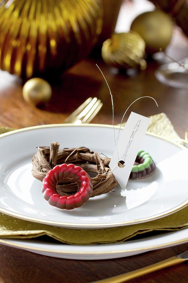 Small Chocolate Rings And Mini Wreath Used As Name Tag On Plate Photograph by Angela Francisca Endress