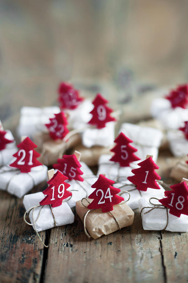 Small Gifts With Numbered, Felt Christmas Trees Photograph by Alicja Koll