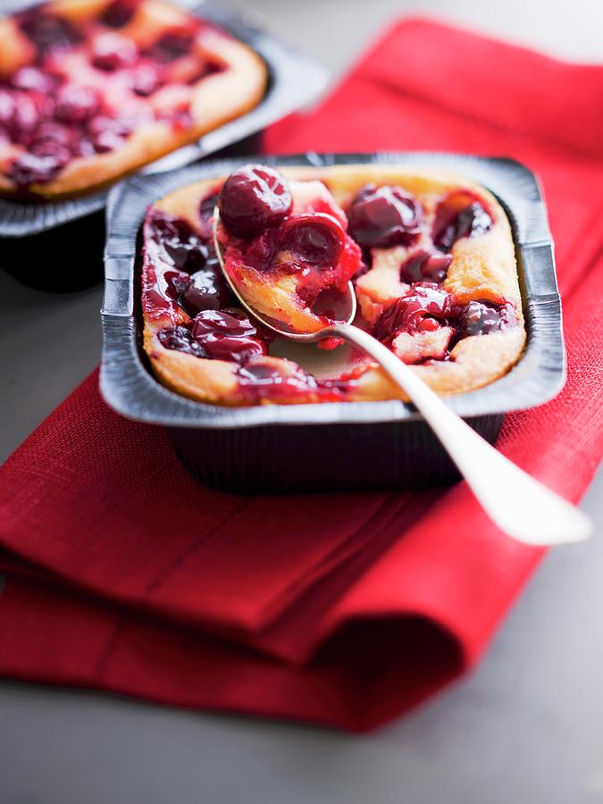 Small Griotte Cherry Batter Puddings Photograph by Roulier-turiot