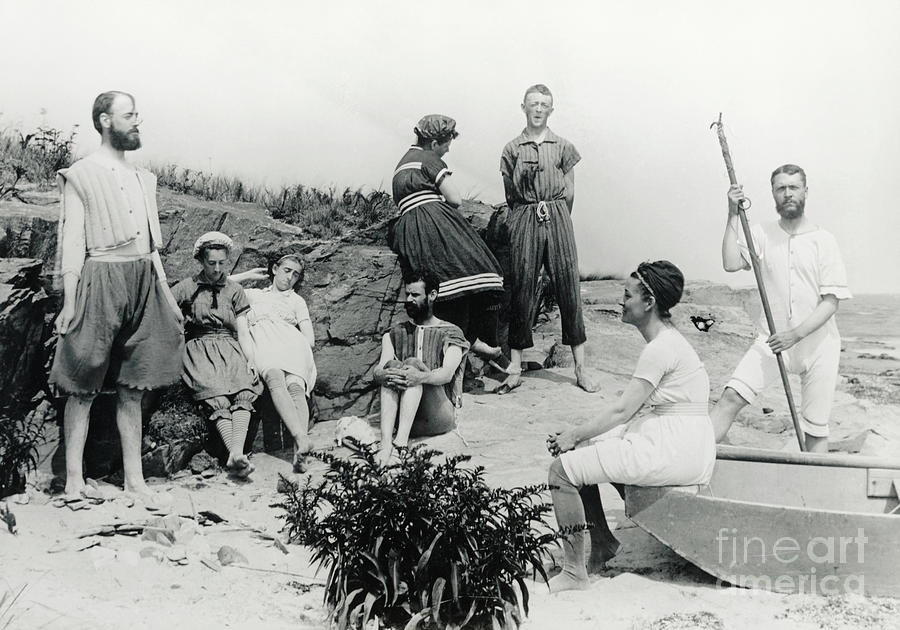 Small Group Of Bathers On Beach Photograph by Bettmann
