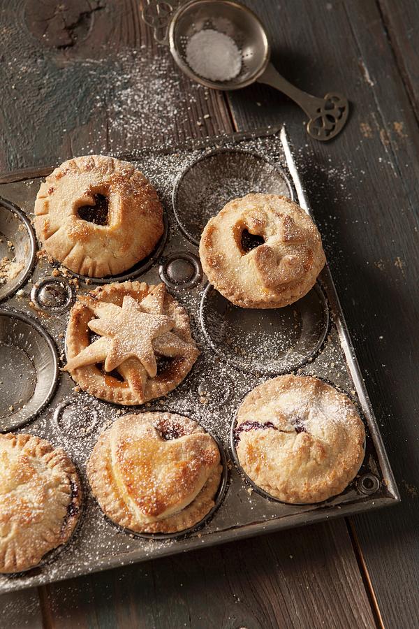 Small Mince Pies In A Vintage Baking Tray Photograph by Stacy Grant