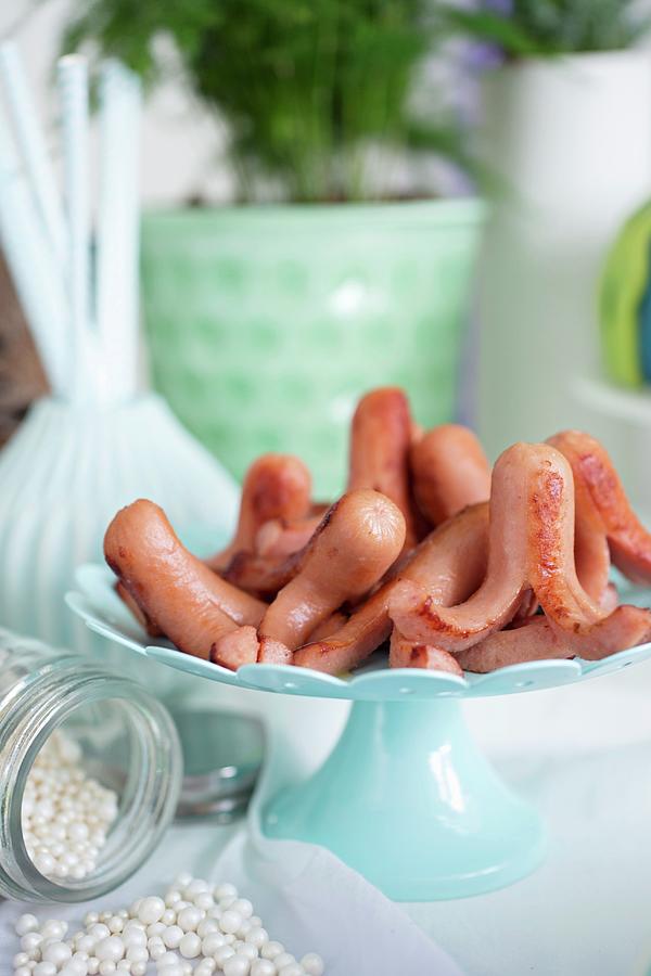Small Octopus Sausages For A Maritime Themed Party Photograph by Cecilia Mller