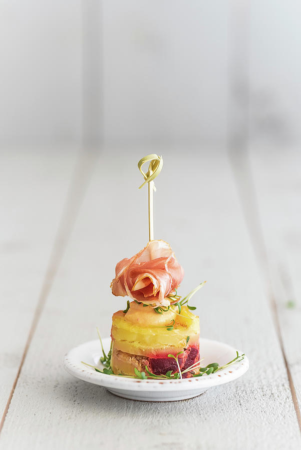Small Potato Tortilla With Cress, Raw Ham And A Skewer Photograph by M. Nlke