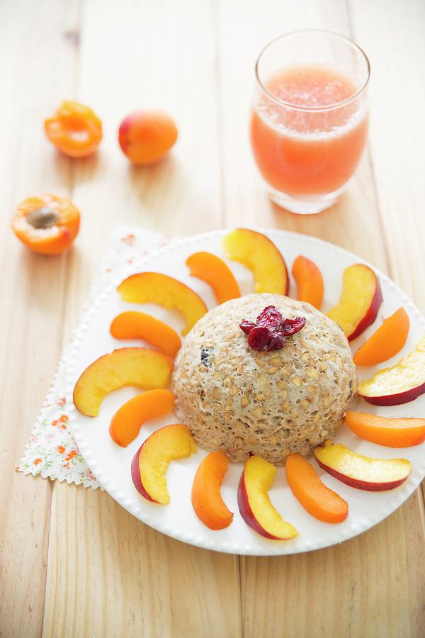 Small Spelt Bowl Cake With Bananas, Cranberries, Quarters Of Apricots And Nectarines Photograph by Tombini