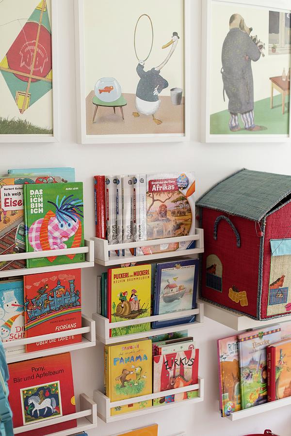 Small Spice Racks Used As Shelves For Childrens Books Photograph by Wiener Wohnsinn
