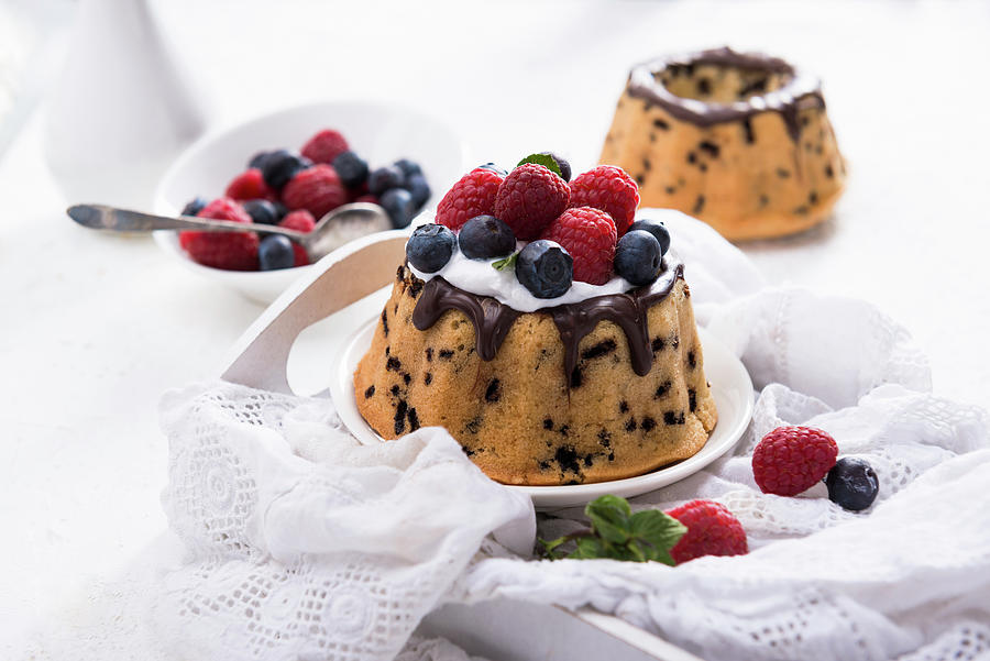 Small Vegan Stracciatella Sponge Cakes With Soy Cream And Berries Photograph by Kati Neudert