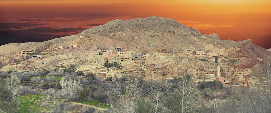 Small village of mud brick houses in mountain valley  Photograph by Steve Estvanik