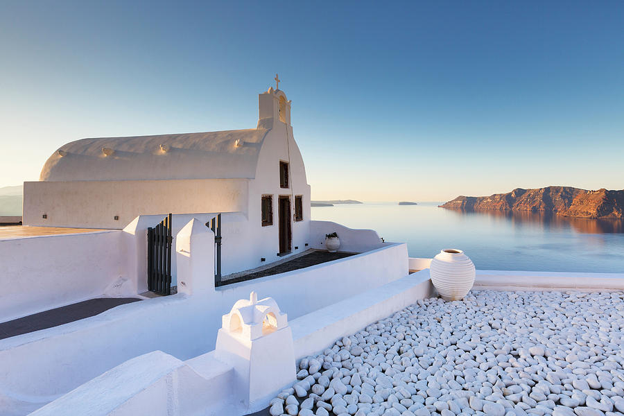 Greek Photograph - Small White Church In Oia Village On Santorini Island, Greece. by Cavan Images