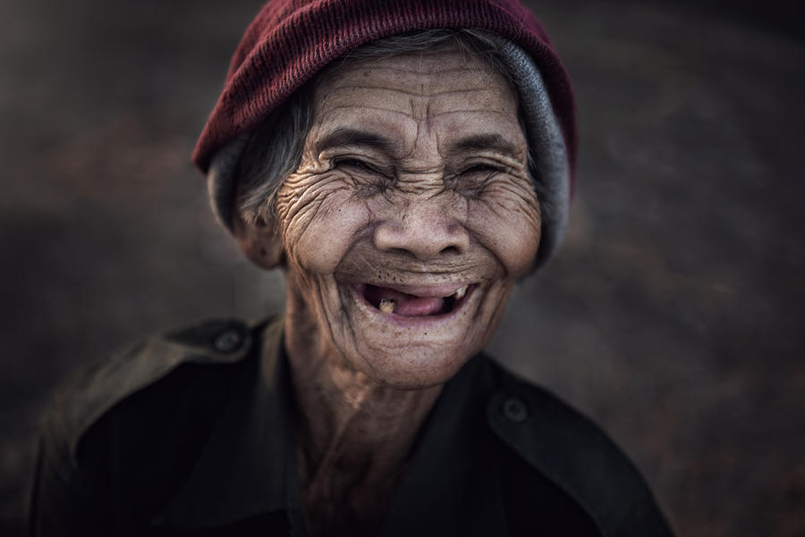 Smile Photograph by Sarawut Intarob
