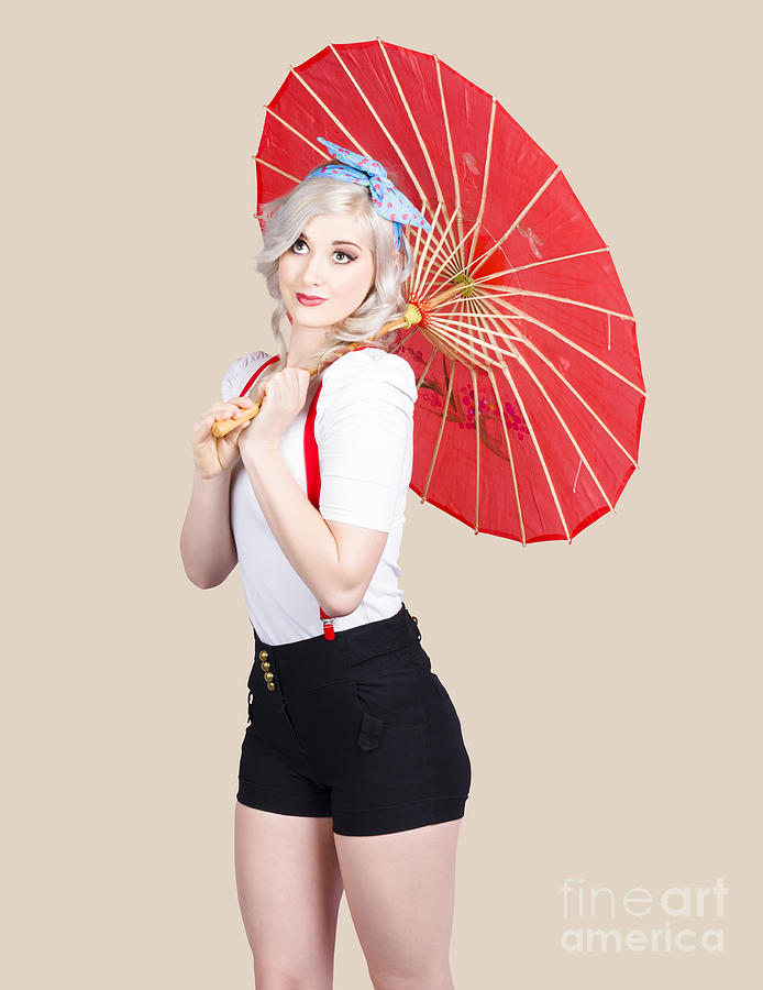 Smiling retro woman holding a red umbrella  Photograph by Jorgo Photography