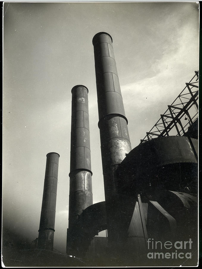 Smoke Stacks Of Factory Photograph by Bettmann