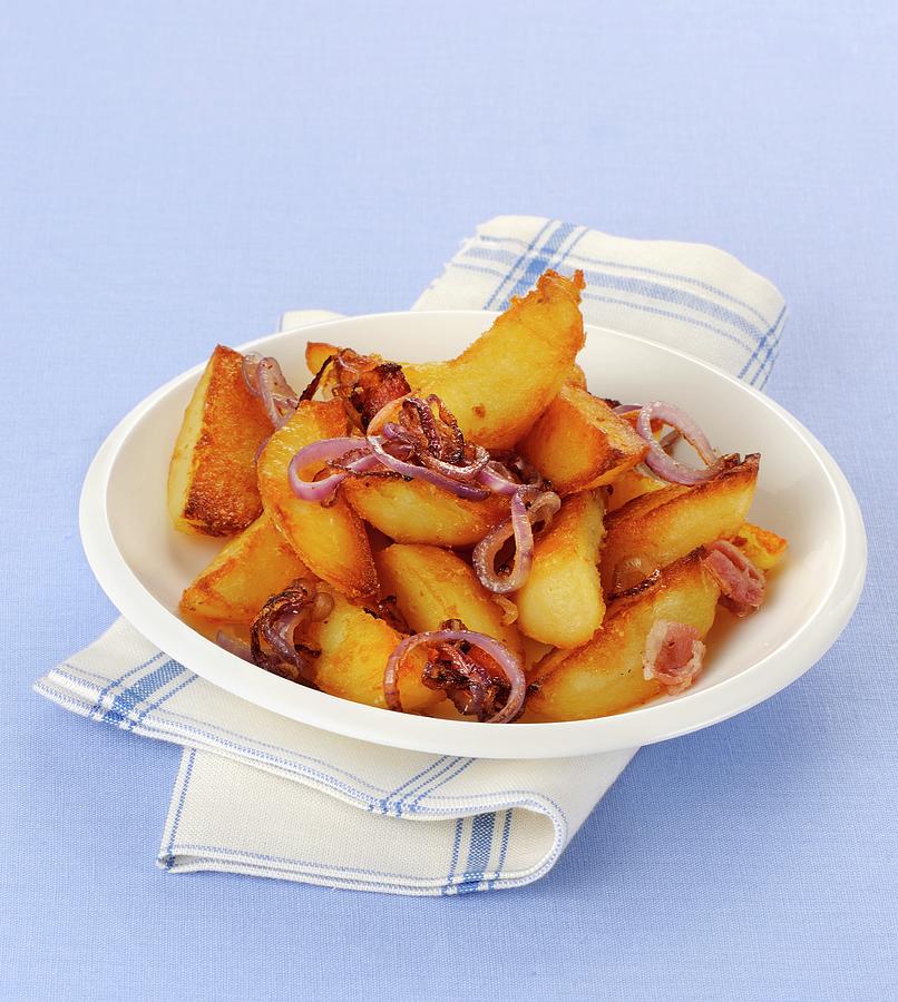 Smoked And Fried Potatoes With Onion Photograph by Franco Pizzochero