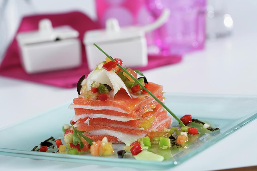 Smoked Cod Millefeuille With Tomato Jelly And Black Olives Sauce Photograph by Gastromedia