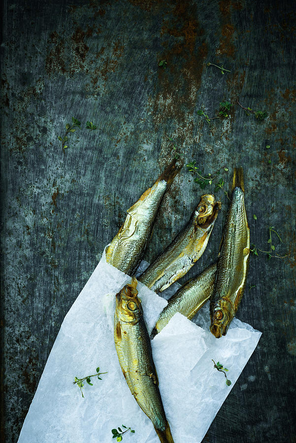 Smoked Kiel Sprats In A Parchment Bag On A Tray Photograph by M. Nlke