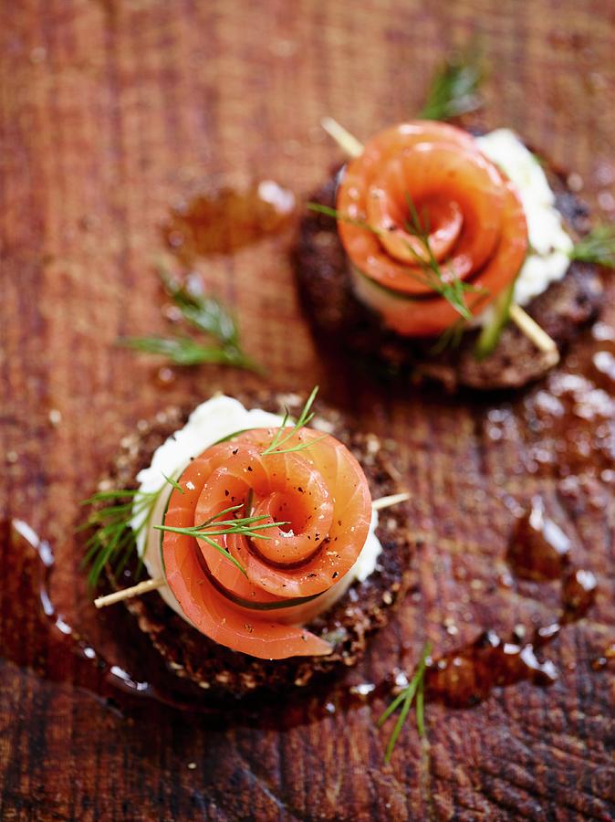 Smoked Salmon Roses On Pumpernickel Photograph by Oliver Brachat