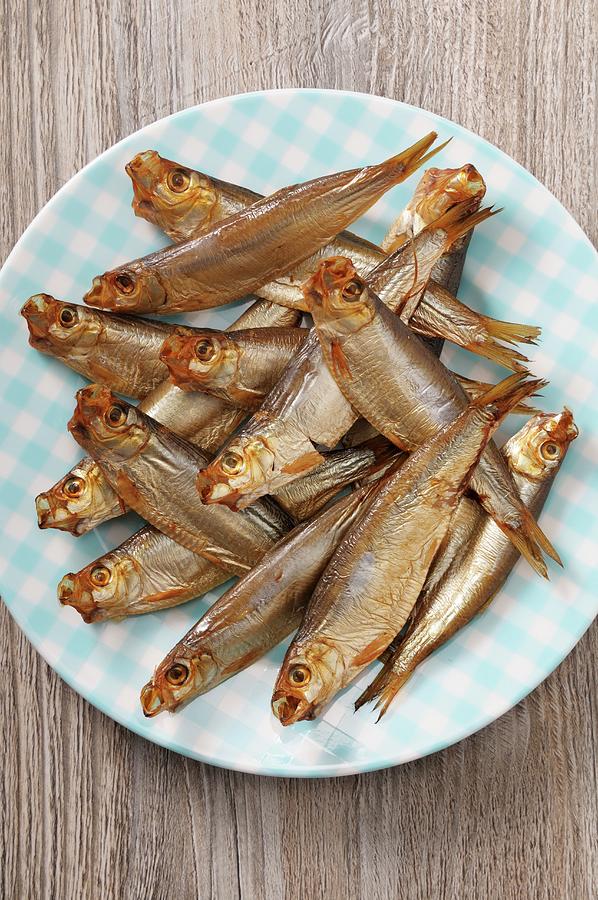 Smoked Sprats On A Plate seen From Above Photograph by Jean-christophe Riou