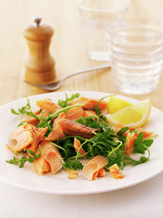 Smoked Trout And Rocket Salad Garnished With A Lemon Wedge Photograph by Frank Adam