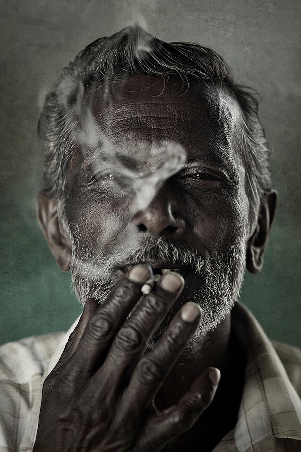 Portrait Photograph - Smoker by Raeid Allehyane