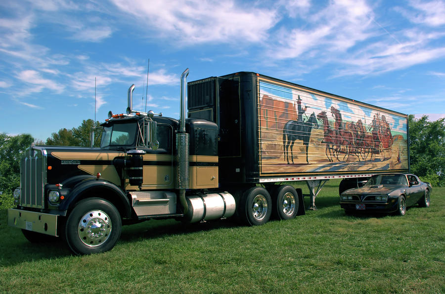 Smokey and the Bandit Tribute  Kenworth W900 Black and Gold Semi Truck Photograph by TeedMack