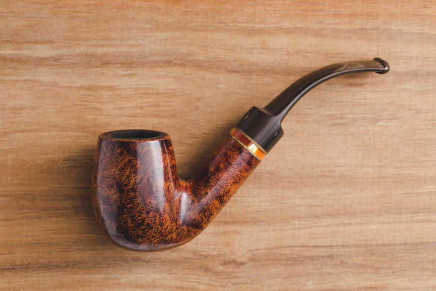 Smoking Pipe On Wood Photograph by Andrew Pacheco