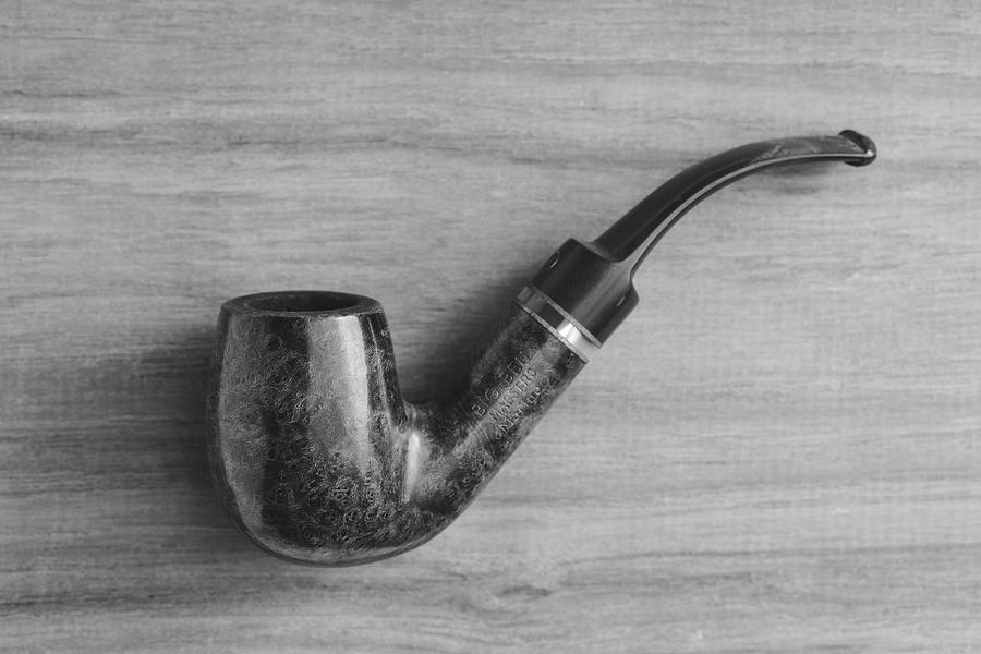 Smoking Pipe On Wood Black and White Photograph by Andrew Pacheco