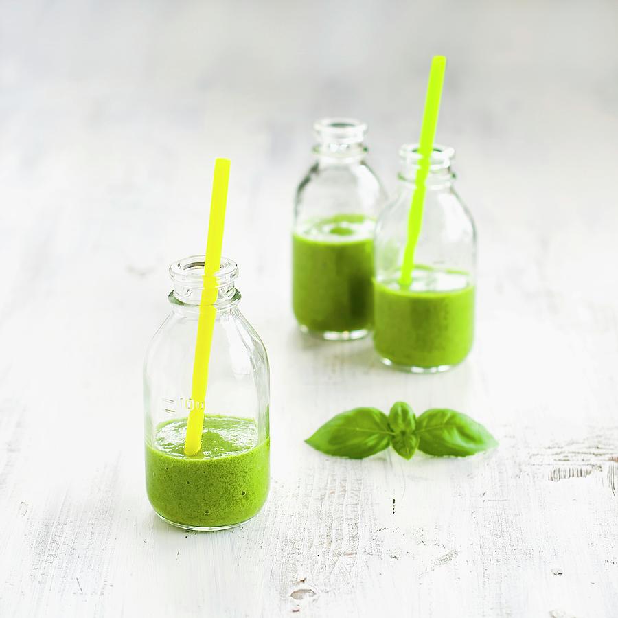 Smoothie Made With Spinach And Basil Photograph by Mariola Streim