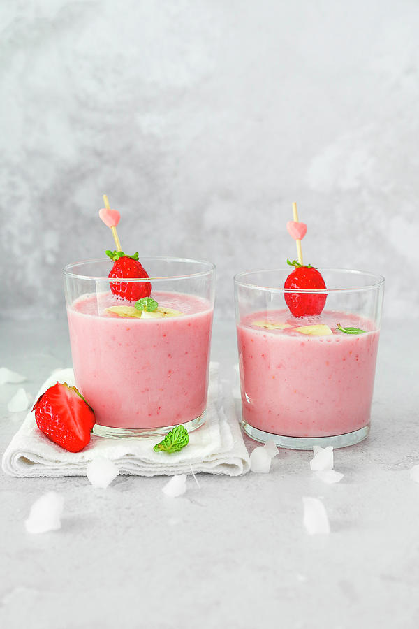 Smoothie With Milk Banana And Fresh Strawberry Photograph by Claudia Gargioni