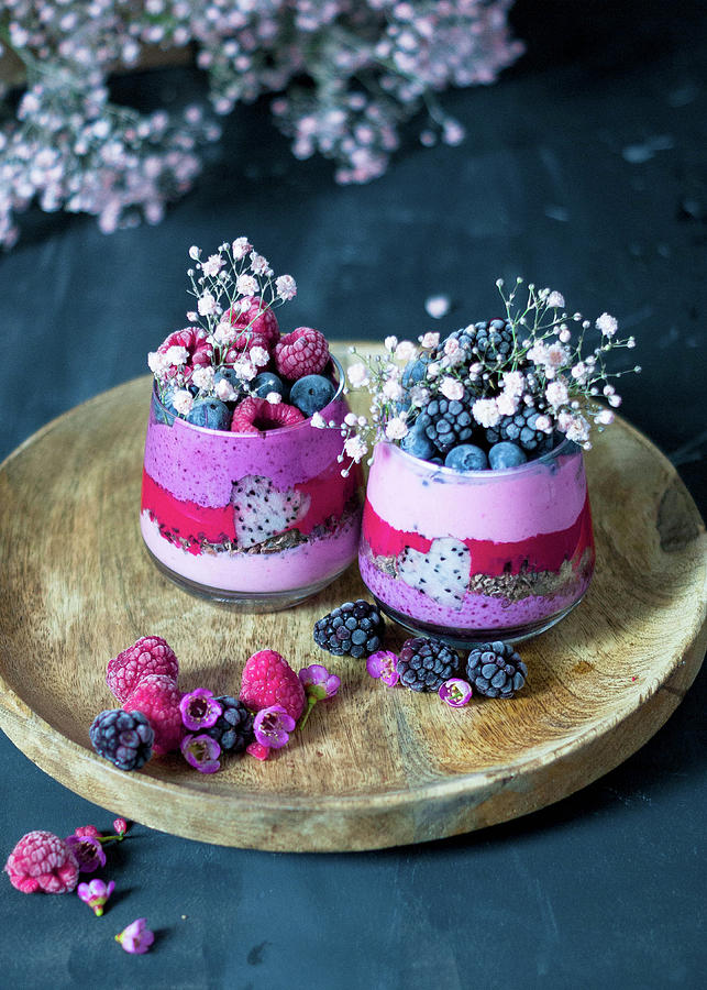 Smoothies strawberries, Raspberries, Blueberries With Dragon Fruit And Chocolate Muesli Photograph by Elena Ecimovic
