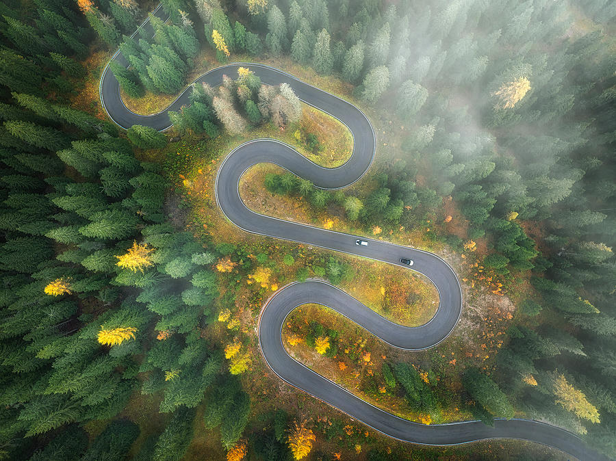 Snake-like Road In A Foggy Day Photograph by Mei Xu