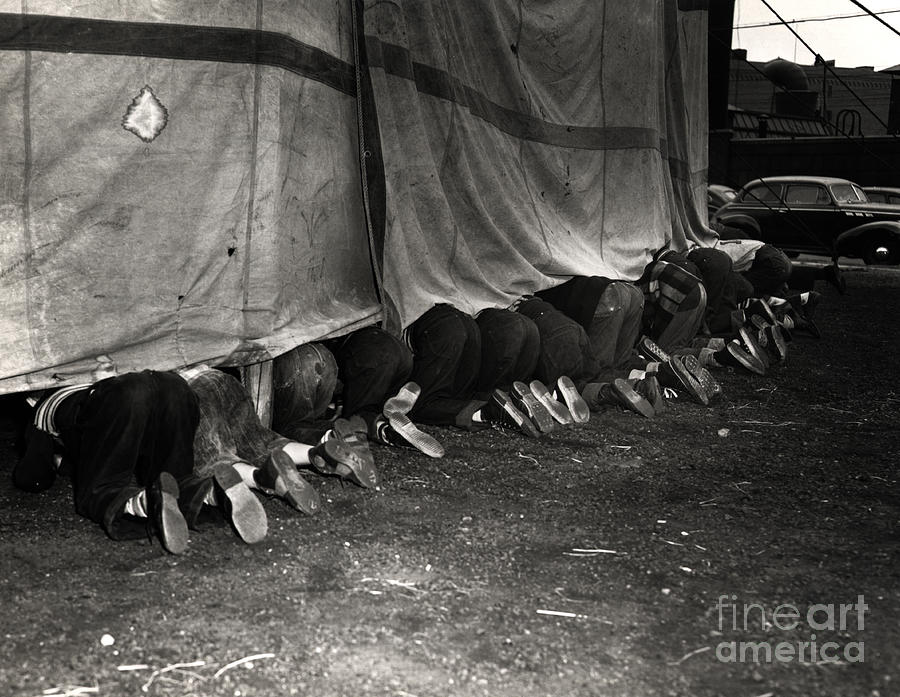 Sneaking Under A Circus Tent Photograph by Bettmann Sneaking Under A Circus Tent Photograph by Bettmann