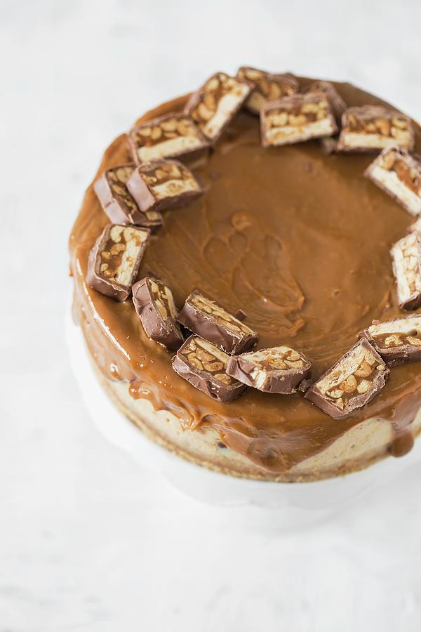 Snickers Cheesecake With Caramel Ganache Photograph by Malgorzata Laniak
