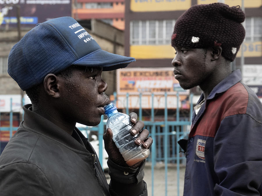 Sniffing Glue In The Streets Of Nairobi Photograph by ...