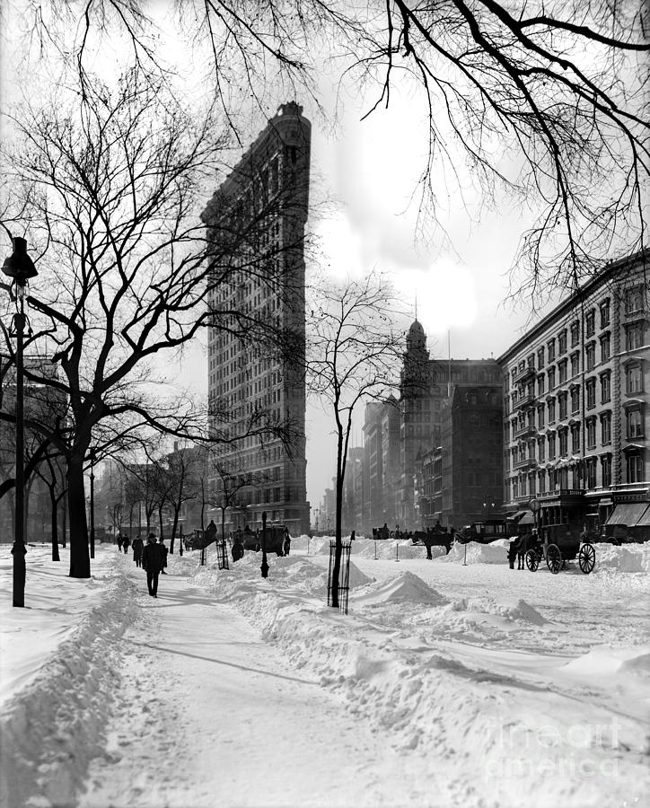 Times Square Photograph - Snow at the Flatiron Building by Jon Neidert