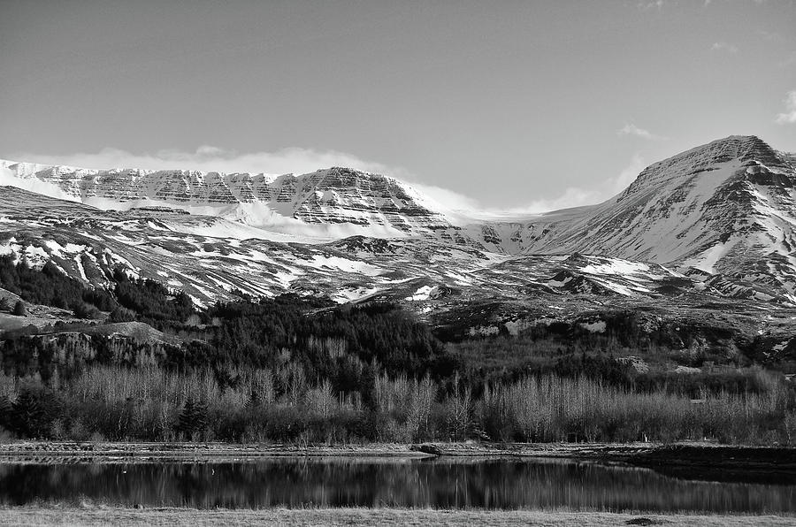 Snow Brushed Mountains Above Lake Landscape Iceland Black and White Photograph by Shawn OBrien