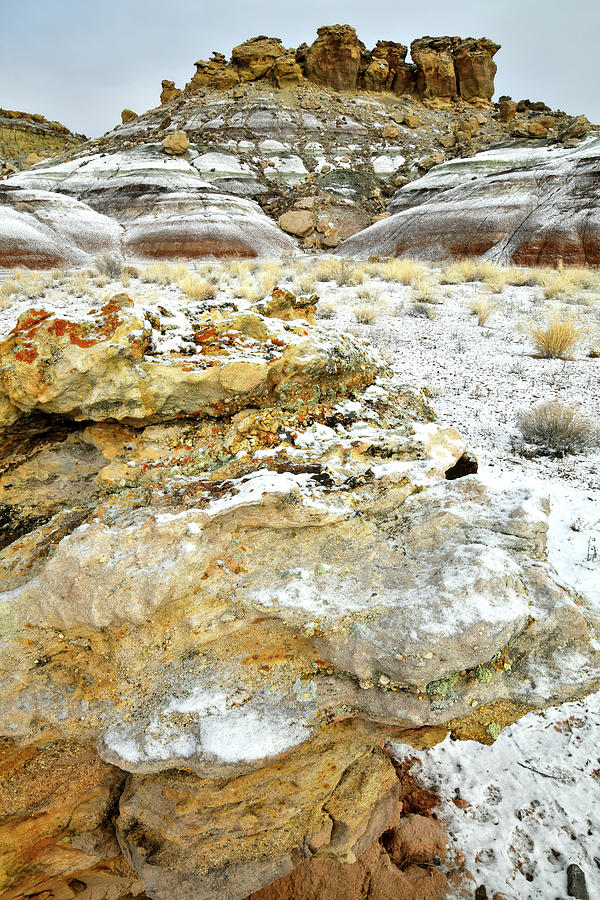 Snow Covered Bentonite Dunes and Boulders near Ruby Mountain Photograph by Ray Mathis