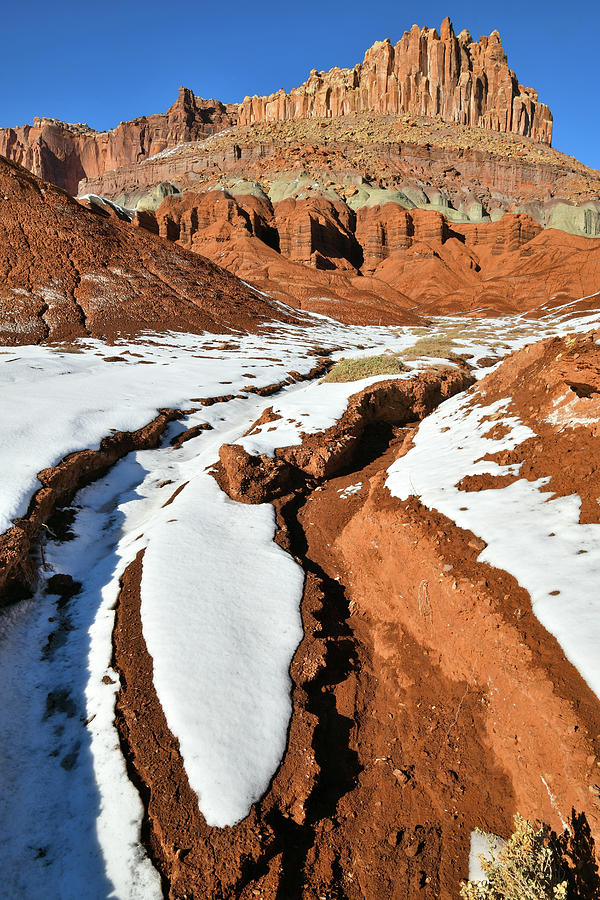 Snow Melting Beneath the Castle in Capitol Reef NP Photograph by Ray Mathis