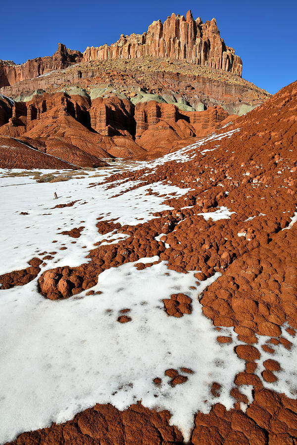 Snow Mosaic Beneath the Castle in Capitol Reef Photograph by Ray Mathis