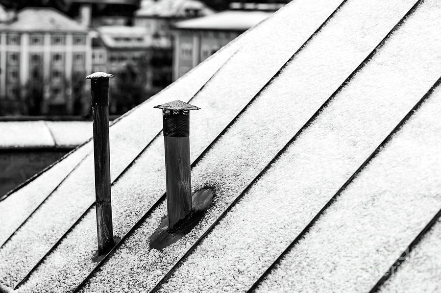 Architecture Photograph - Snow on the Roof in Salzburg by John Rizzuto