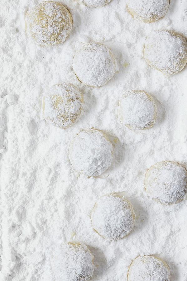 Snowball Cookies With Icing Sugar Photograph by Malgorzata Laniak