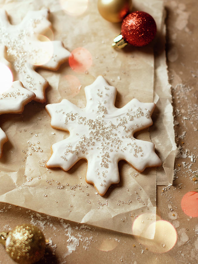Snowflake Cookies With White Chocolate Icing Photograph by Maria Squires