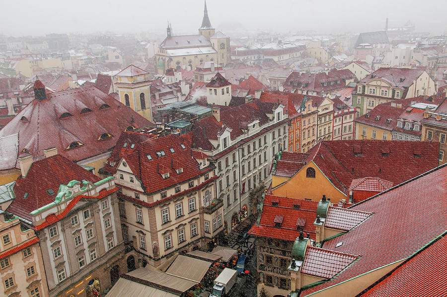 Snowy Christmas Prague. Overview of Old Town Photograph by Jenny Rainbow