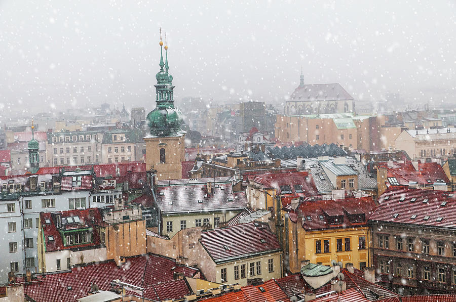 Snowy Christmas Prague. Red Roofs and Towers Photograph by Jenny Rainbow